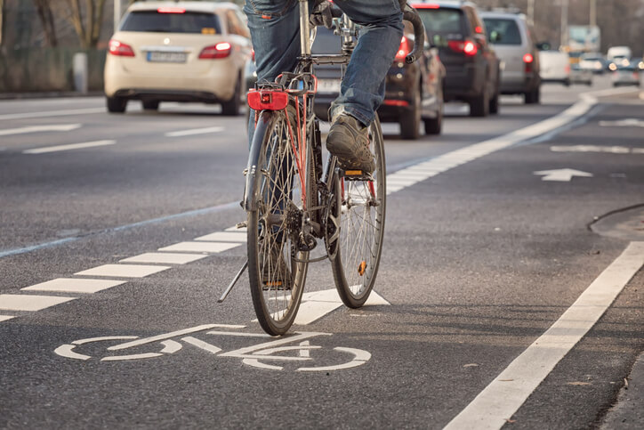 cyclist riding on a city street